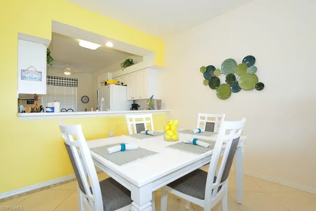 a view of kitchen and dining room with furniture
