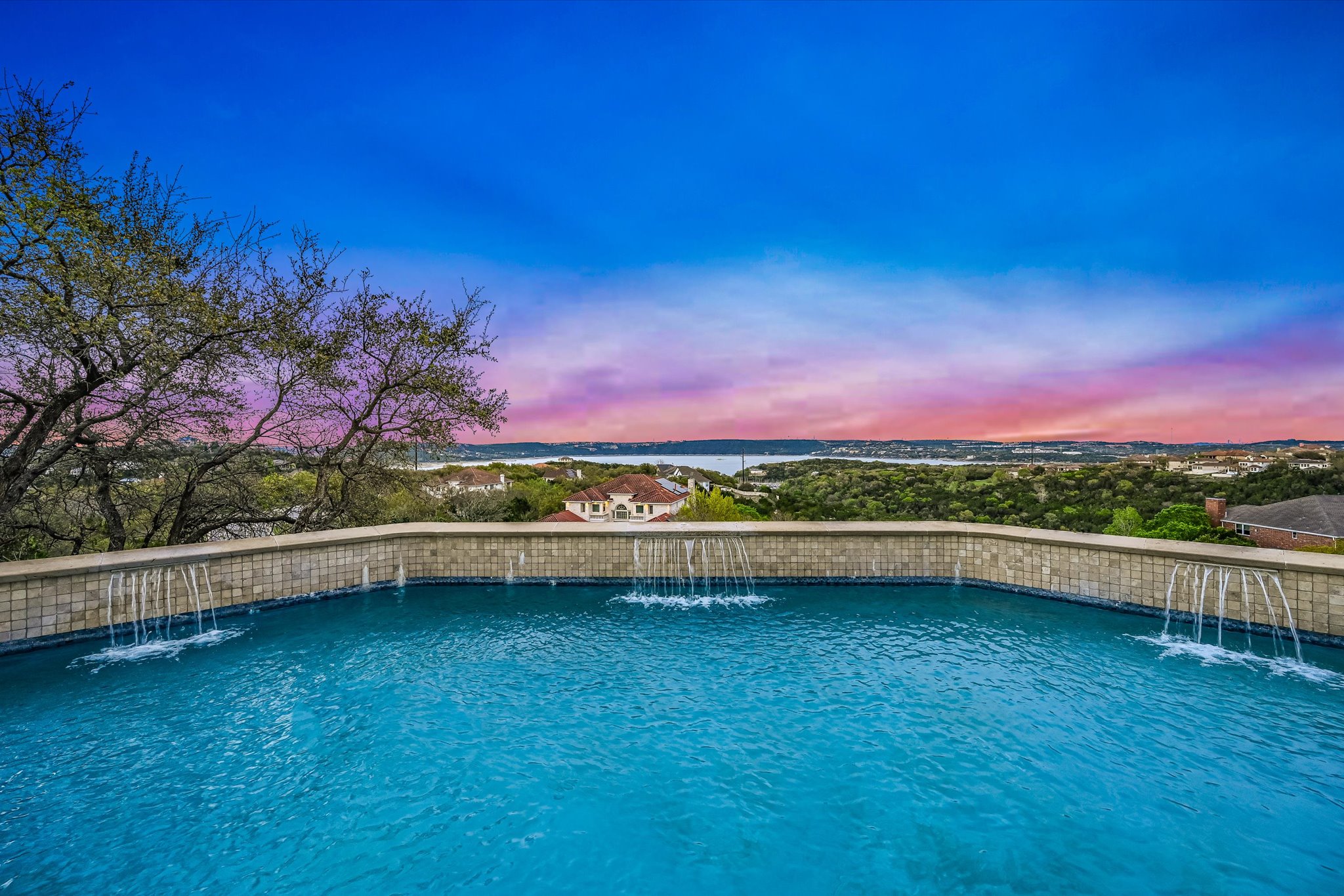 4319 Rum Runner Road Austin, TX 78734 - Photo 38 of 40 Pool at dusk with an outdoor pool