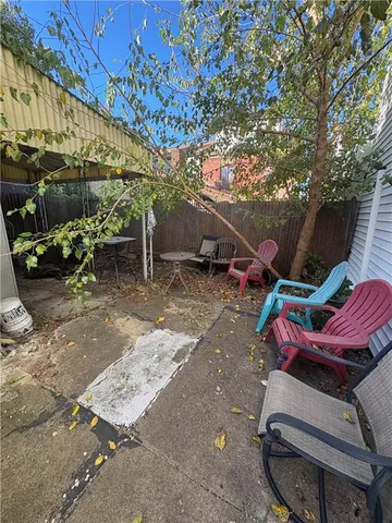 a view of a back yard of a building