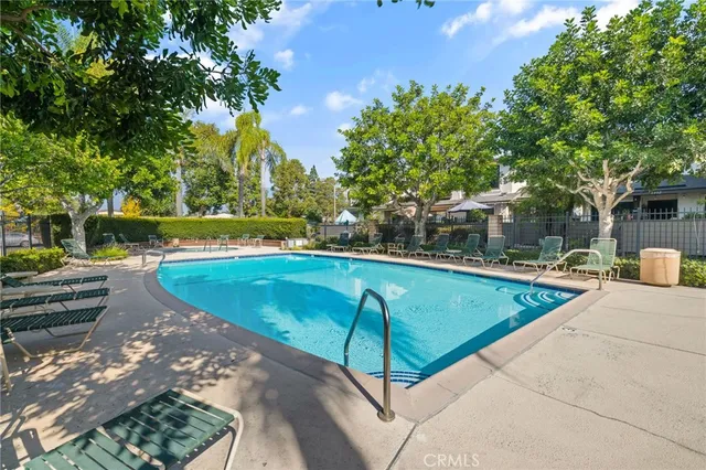 a view of a swimming pool with a patio
