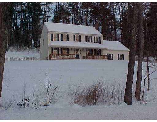 44 Fairview Park Road Sturbridge, MA 01566 - Photo 2 of 7 a front view of a house with a yard