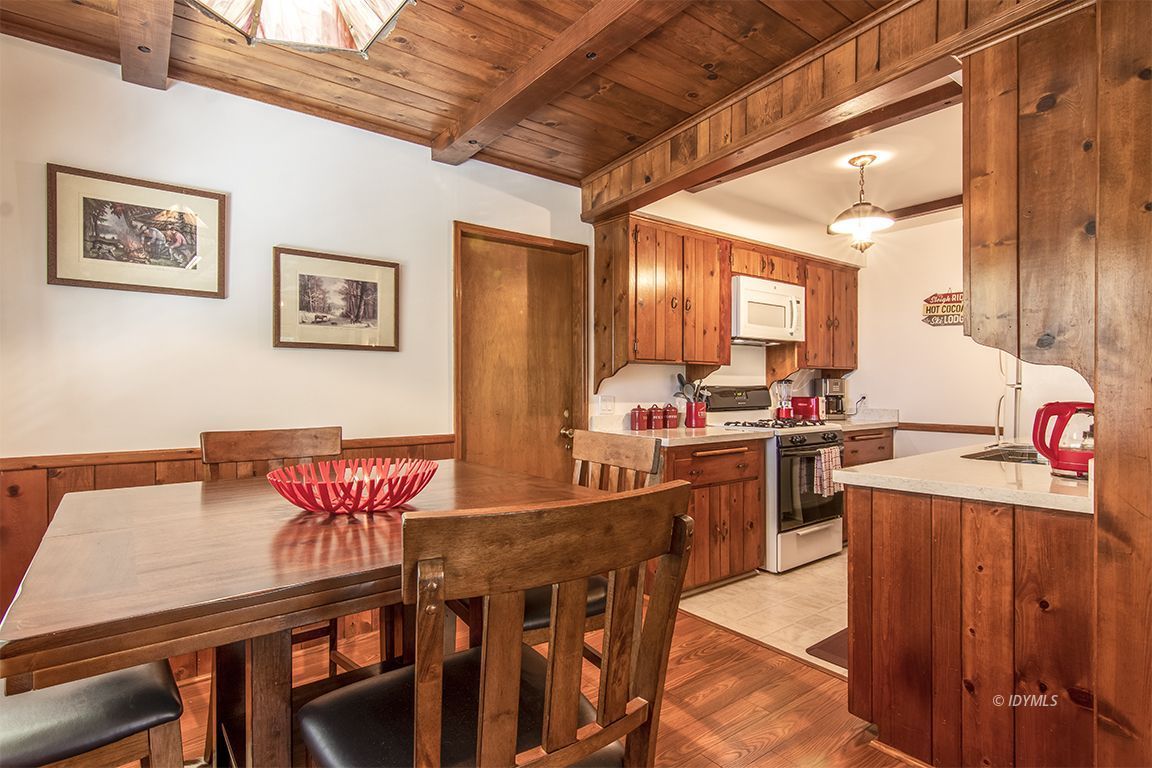 54440 Valley-View Idyllwild, CA 92549 - Photo 15 of 53 a view of a dining room with furniture and window