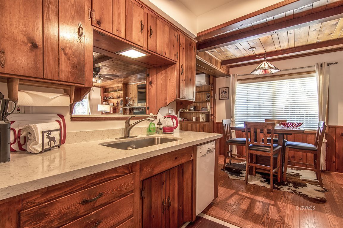54440 Valley-View Idyllwild, CA 92549 - Photo 21 of 53 a kitchen with lots of counter top space and dining table