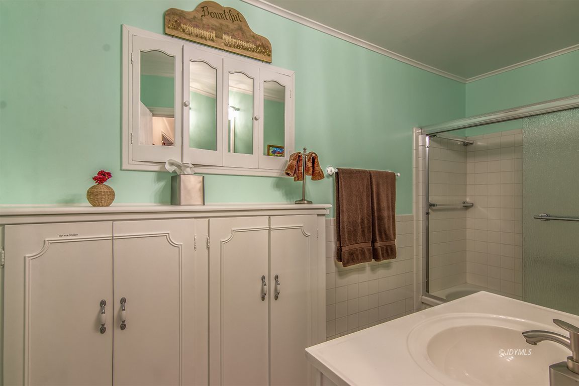 54440 Valley-View Idyllwild, CA 92549 - Photo 26 of 53 a bathroom with a sink and mirror