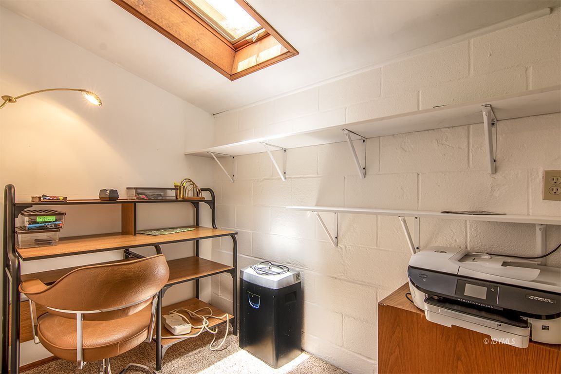 54440 Valley-View Idyllwild, CA 92549 - Photo 34 of 53 a living room with a couch and chandelier