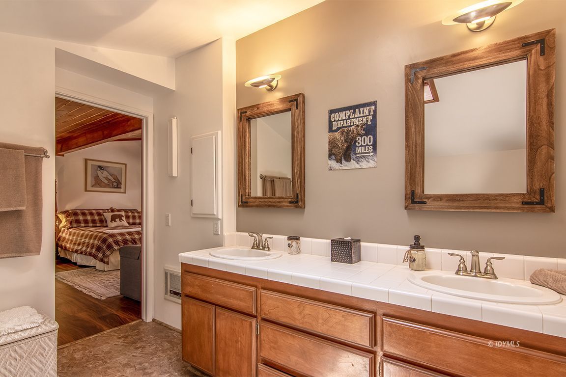 54440 Valley-View Idyllwild, CA 92549 - Photo 38 of 53 a bathroom with a sink and a mirror