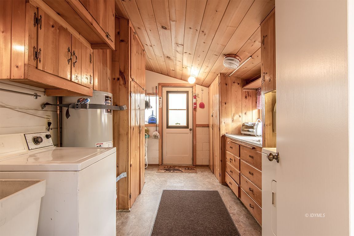 54440 Valley-View Idyllwild, CA 92549 - Photo 39 of 53 a view of a kitchen with refrigerator and cabinets