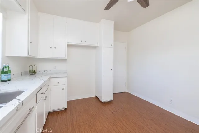 a view of a bathroom with wooden floor