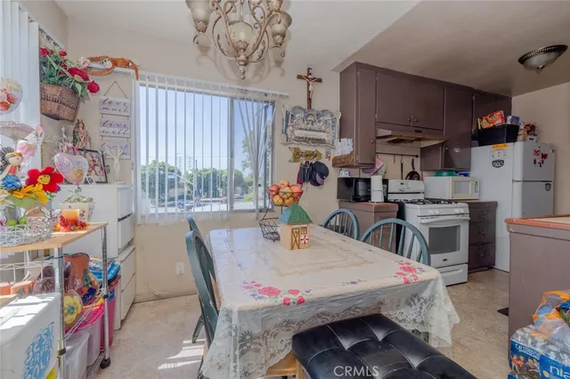 a bathroom with a sink a vanity and a shower curtain