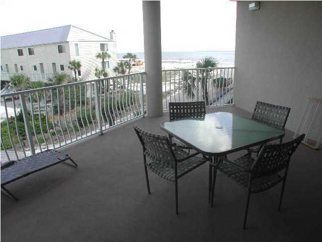 Dunes Of Seagrove Santa Rosa Beach, Unit 201A Santa Rosa Beach, FL 32459 - Photo 16 of 16 a view of a balcony with table and chairs