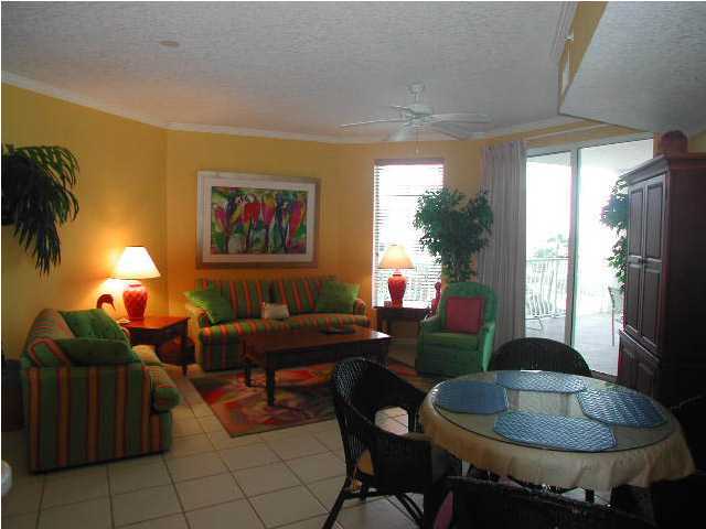 Dunes Of Seagrove Santa Rosa Beach, Unit 201A Santa Rosa Beach, FL 32459 - Photo 6 of 16 a living room with furniture and a potted plant