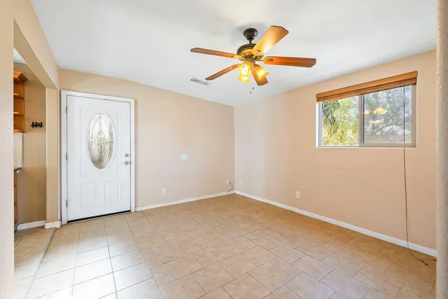 a kitchen with stainless steel appliances a refrigerator sink and cabinets