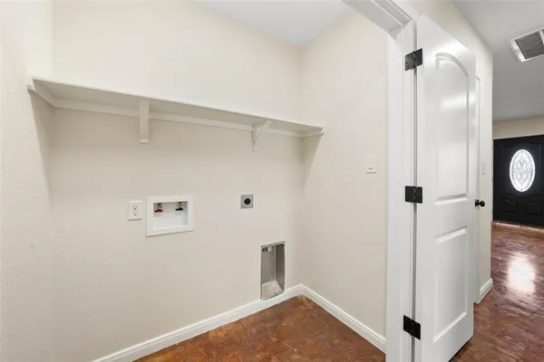 a view of a hallway with closet