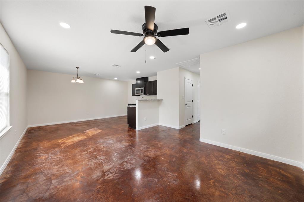 1126 North 11th Street Waco, TX 76707 - Photo 13 of 22 a view of an empty room and kitchen view