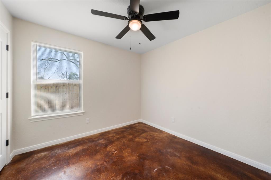 1126 North 11th Street Waco, TX 76707 - Photo 15 of 22 an empty room with a window and a fan