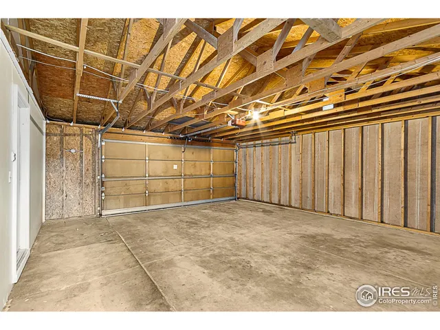 a view of a room with wooden walls
