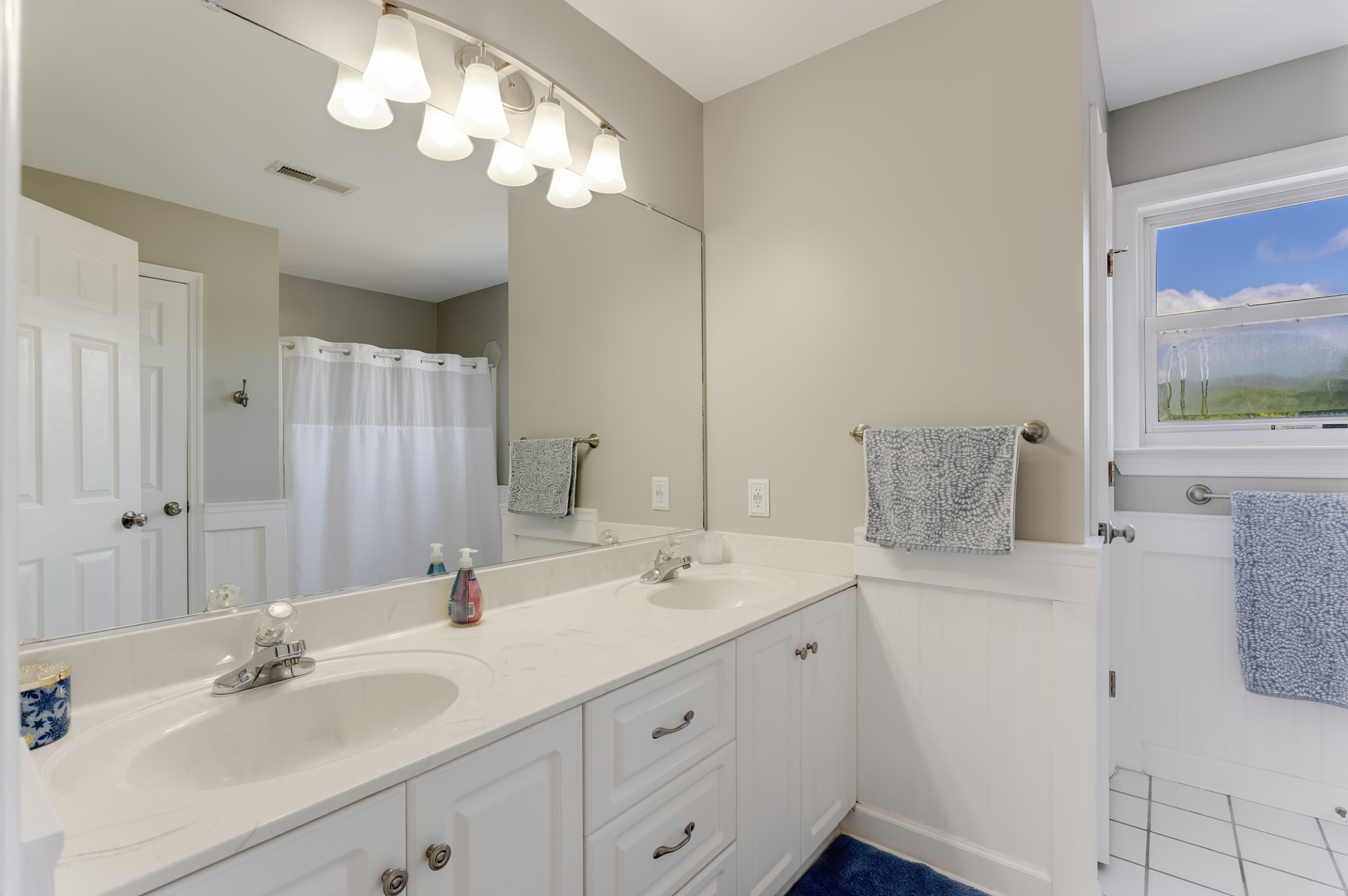 1446 Kittrell Road Franklin, TN 37064 - Photo 19 of 71 a bathroom with a sink vanity granite and a mirror