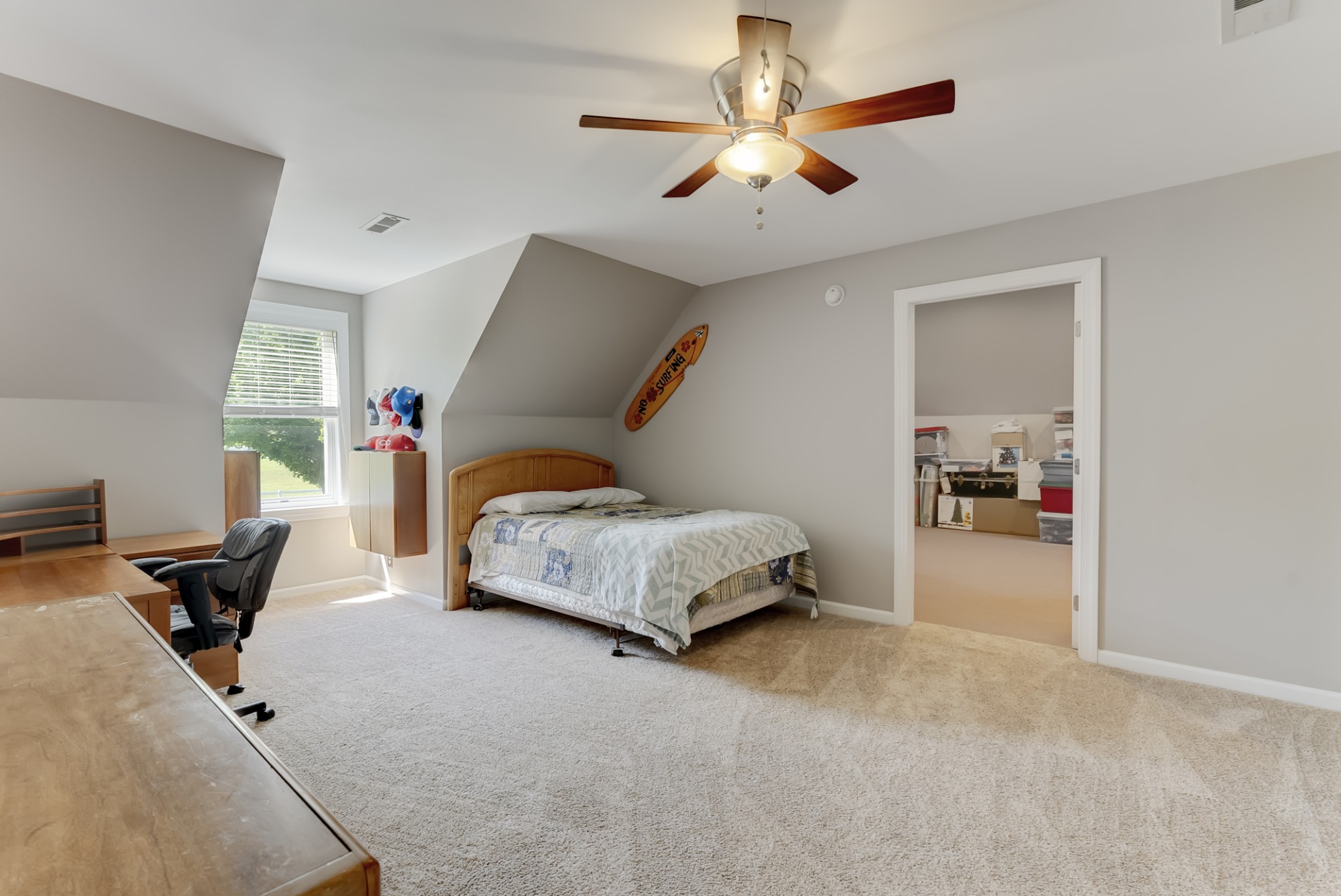 1446 Kittrell Road Franklin, TN 37064 - Photo 34 of 71 a bedroom with a bed and a chandelier