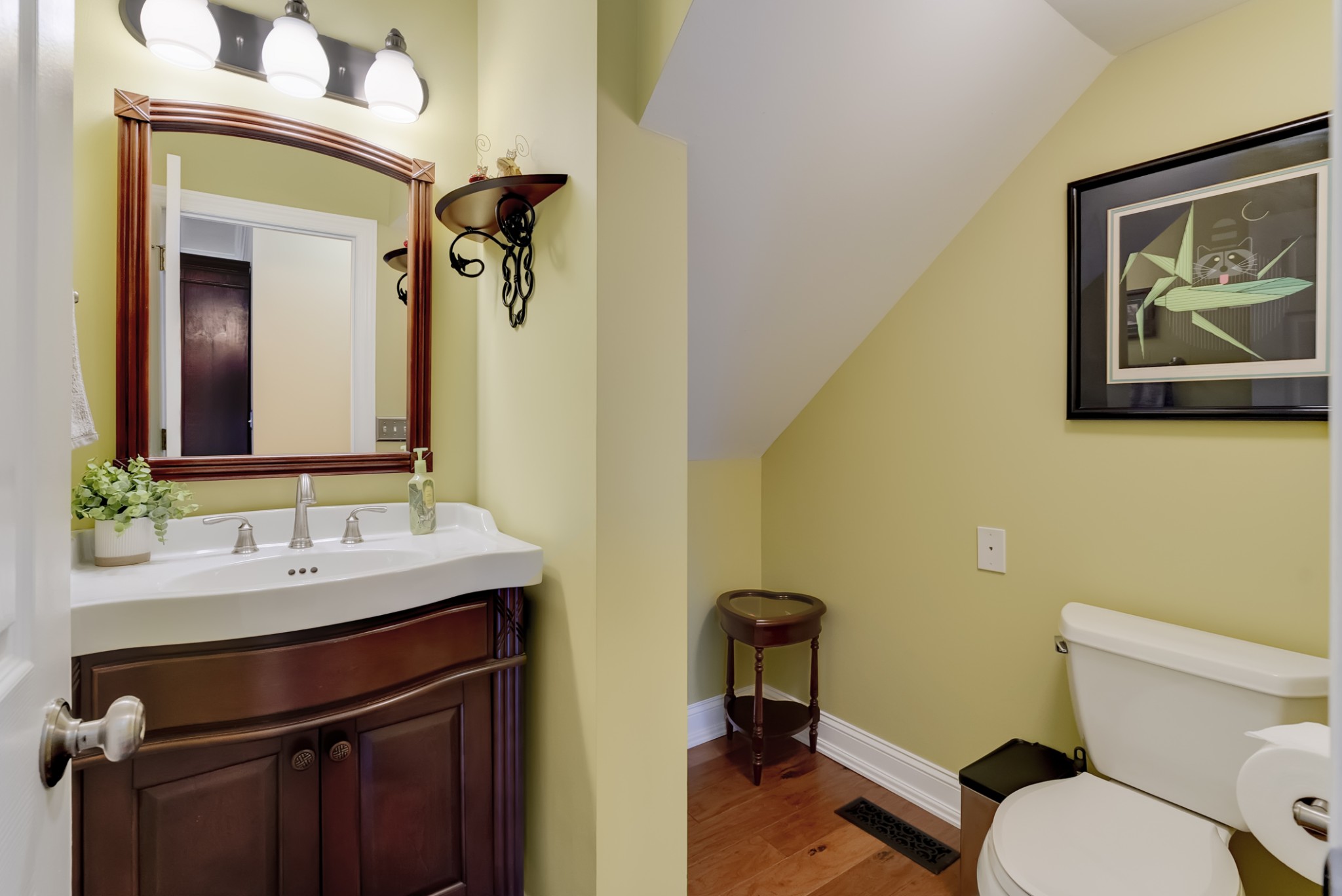 1446 Kittrell Road Franklin, TN 37064 - Photo 40 of 71 a bathroom with a toilet a sink and mirror