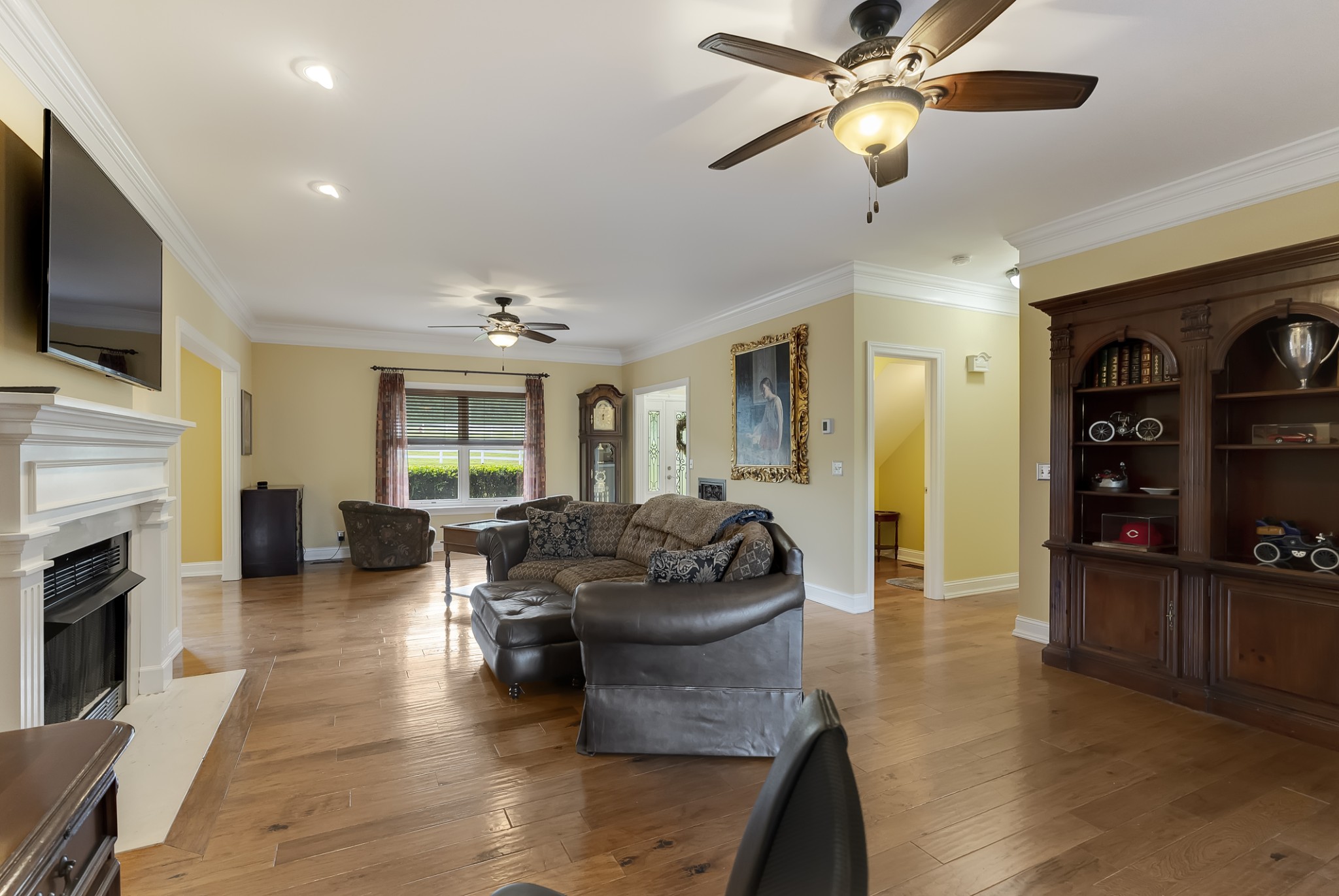 1446 Kittrell Road Franklin, TN 37064 - Photo 6 of 71 a living room with fireplace furniture and a flat screen tv