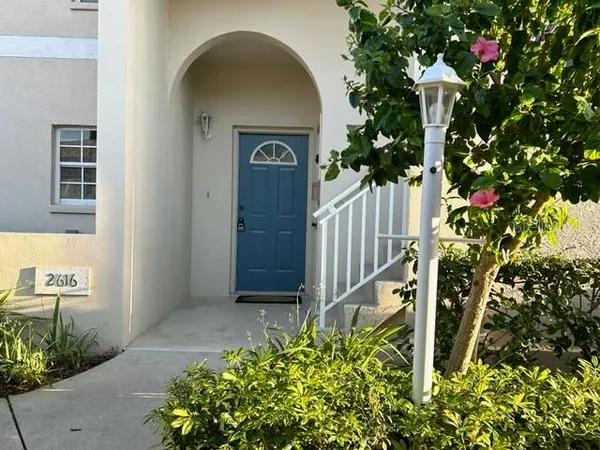 a view of entryway with flower pots