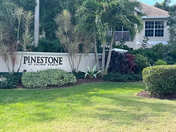 a view of garden with deck and backyard of house