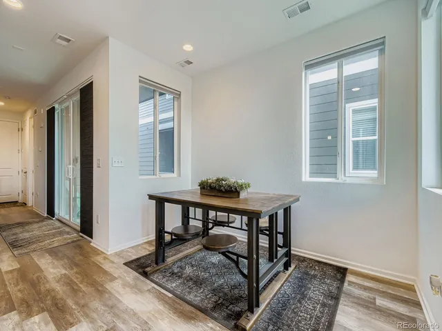 a view of a livingroom with furniture and window