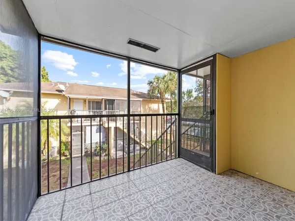a view of hallway with stairs
