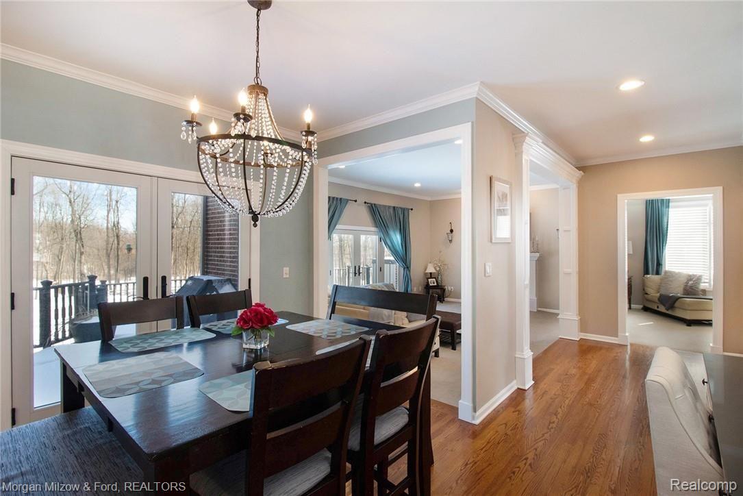 7882 Woodview Road Clarkston, MI 48348 - Photo 15 of 49 Informal dining space with doors leading to the rear deck
