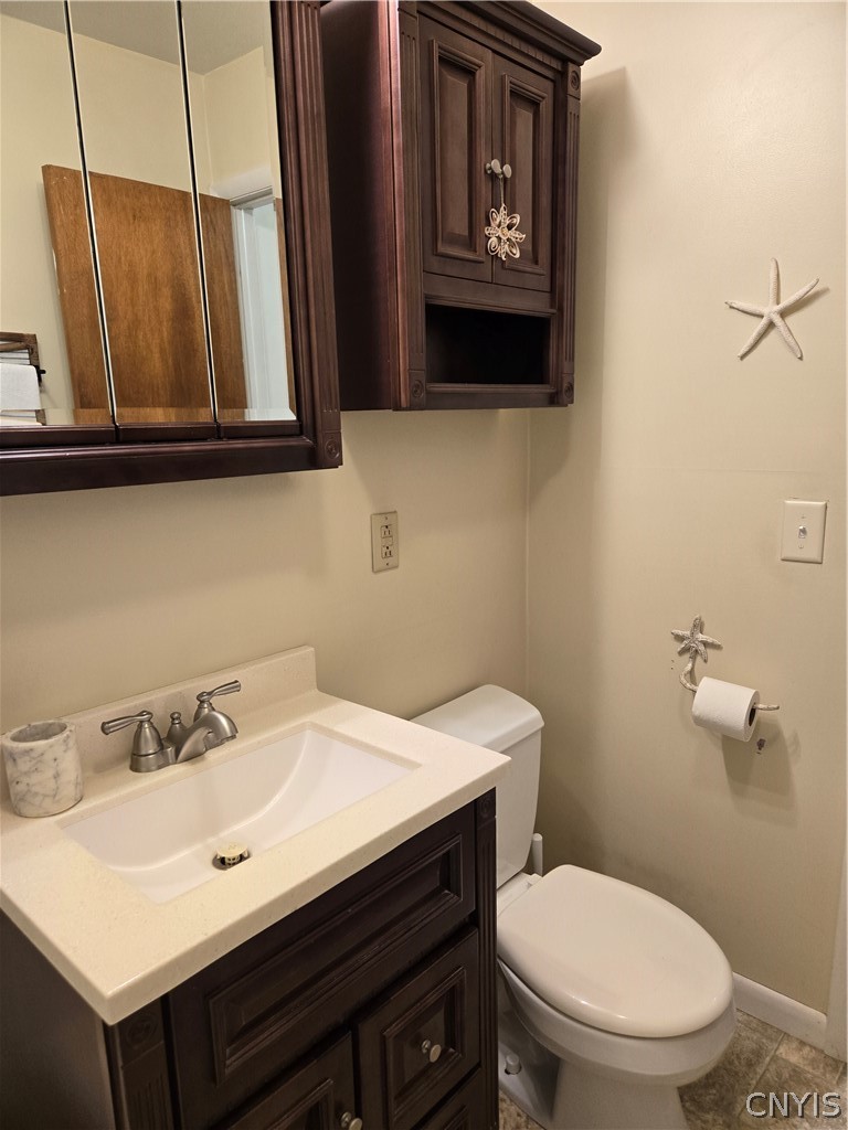 6651 Bishopp Road Rome, NY 13440 - Photo 10 of 24 The main bathroom features a versatile tub/shower