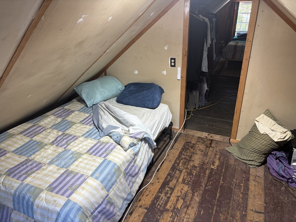 37 Lincoln Highway Wareham, MA 02571 - Photo 20 of 29 a bedroom with a bed and a rug