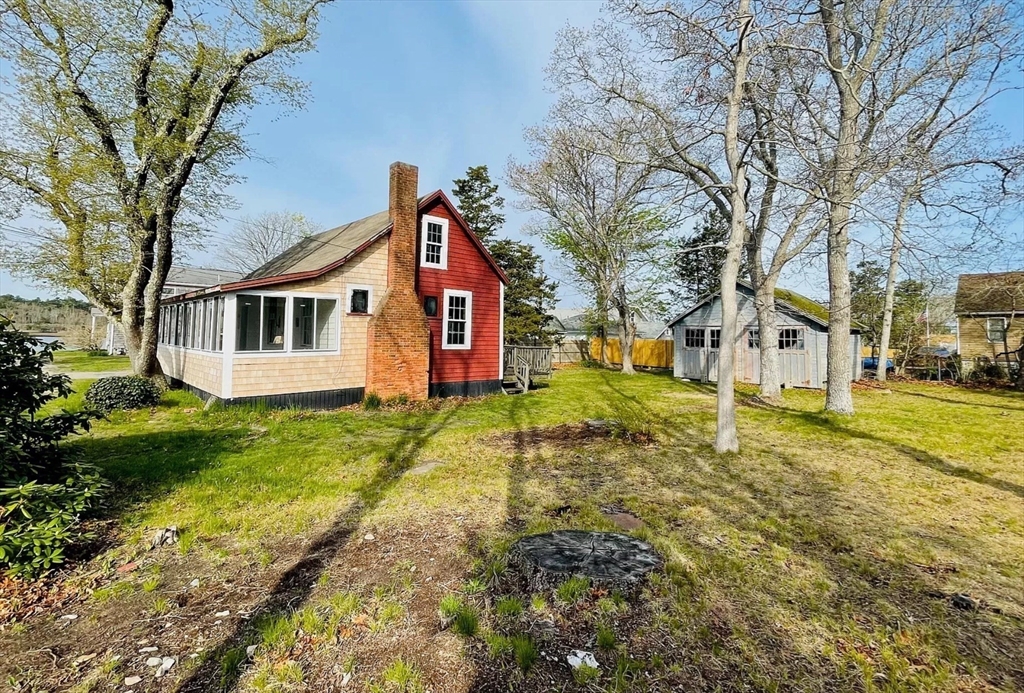 37 Lincoln Highway Wareham, MA 02571 - Photo 3 of 29 a front view of a house with a yard