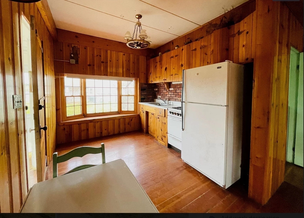 37 Lincoln Highway Wareham, MA 02571 - Photo 9 of 29 a kitchen with refrigerator and window