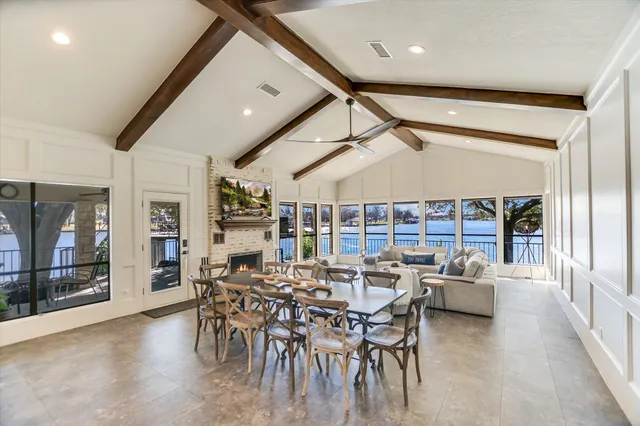 a kitchen with stainless steel appliances granite countertop a refrigerator sink and cabinets