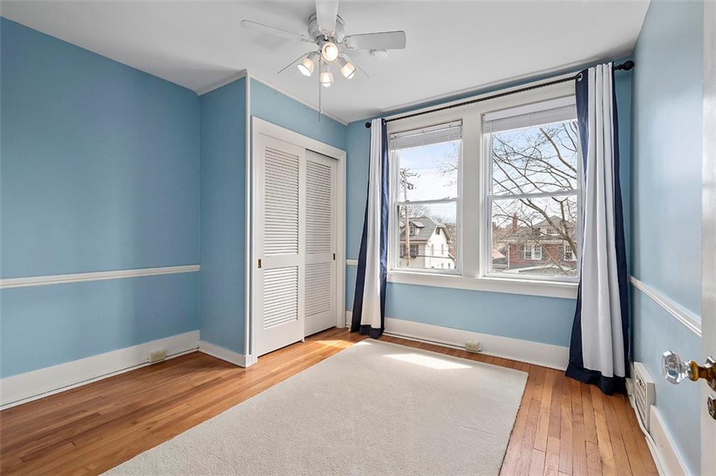 294 Arden Road Pittsburgh, PA 15216 - Photo 15 of 25 a view of livingroom with hardwood floor and ceiling fan