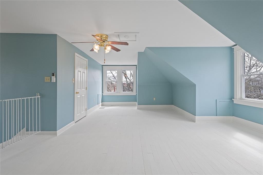 294 Arden Road Pittsburgh, PA 15216 - Photo 17 of 25 a view of a bedroom with chandelier fan and windows