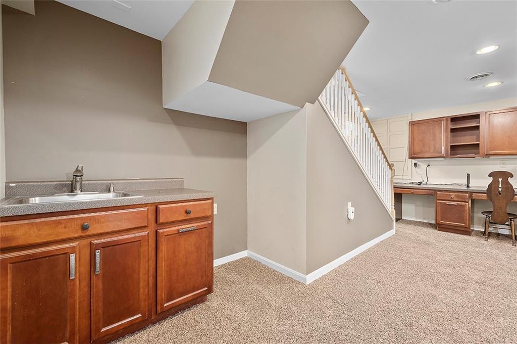 294 Arden Road Pittsburgh, PA 15216 - Photo 20 of 25 a view of a kitchen with furniture and electronic appliances
