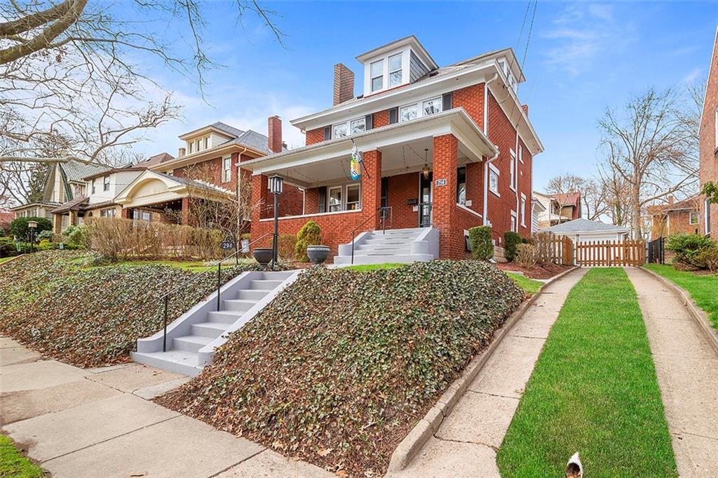 294 Arden Road Pittsburgh, PA 15216 - Photo 2 of 25 a front view of a house with a yard