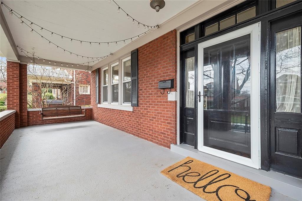 294 Arden Road Pittsburgh, PA 15216 - Photo 4 of 25 a view of an entryway with a floor to ceiling window