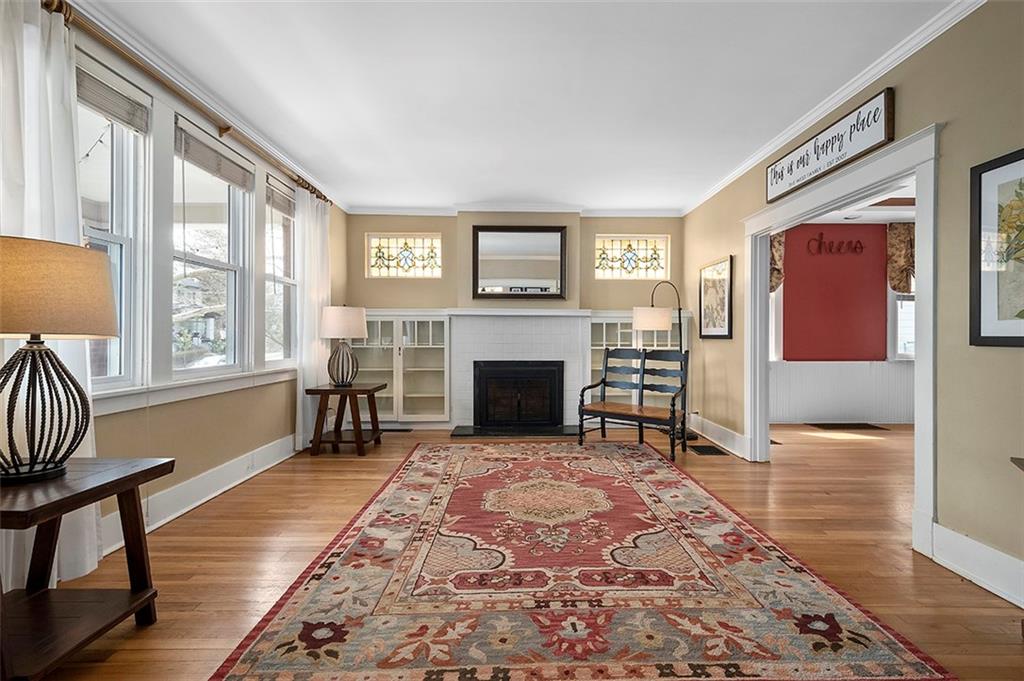 294 Arden Road Pittsburgh, PA 15216 - Photo 6 of 25 a living room with furniture and a fireplace