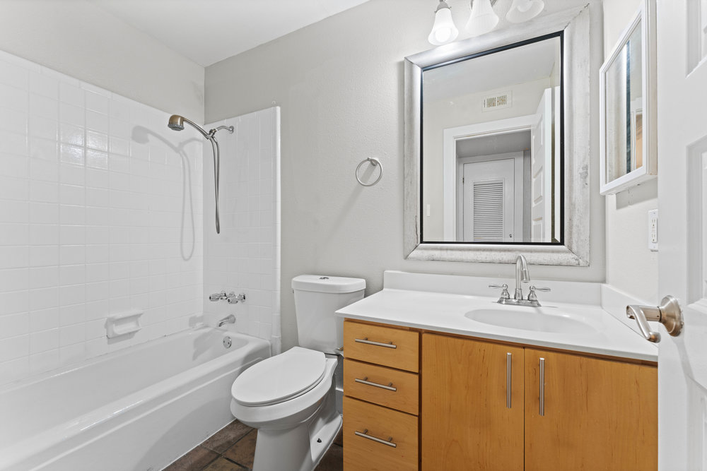 3815 Guadalupe Street, Unit 303 Austin, TX 78751 - Photo 14 of 21 Full bath with shower / bath combination and vanity