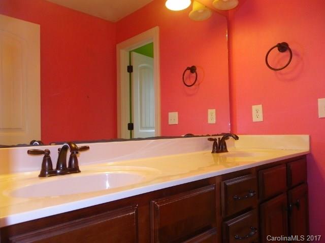1808 Sam Smith Road Fort Mill, SC 29708 - Photo 15 of 20 a bathroom with a sink and a mirror