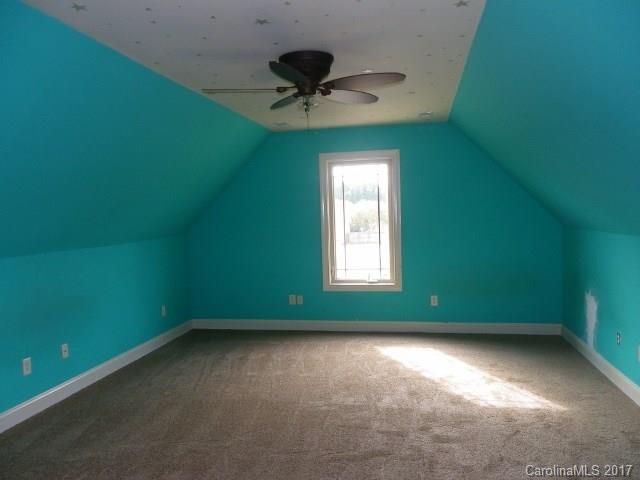 1808 Sam Smith Road Fort Mill, SC 29708 - Photo 17 of 20 an empty room with a window and a fan