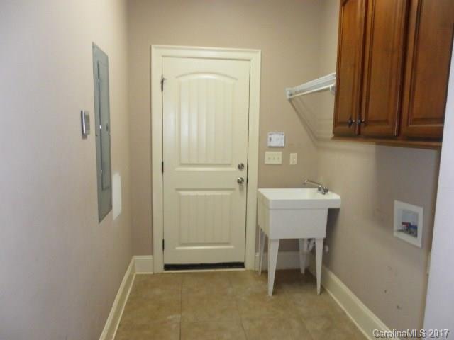 1808 Sam Smith Road Fort Mill, SC 29708 - Photo 18 of 20 a bathroom with a sink and a mirror