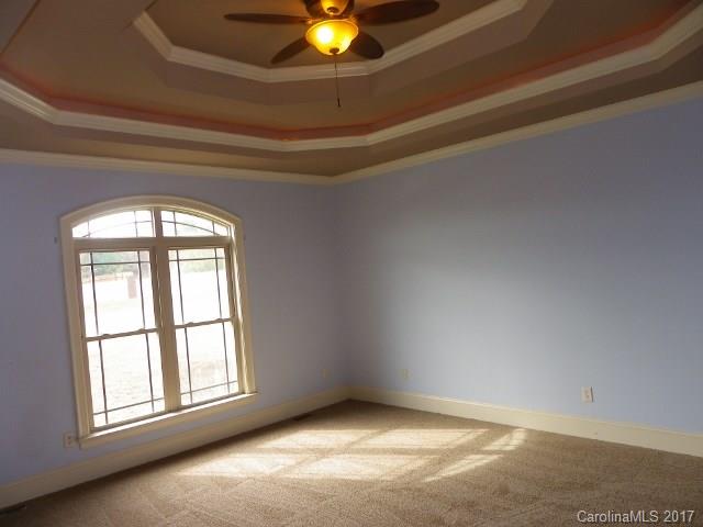 1808 Sam Smith Road Fort Mill, SC 29708 - Photo 8 of 20 an empty room with a empty space and windows