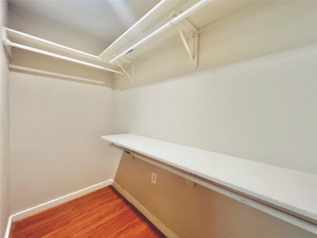 936 Bennington Street Houston, TX 77022 - Photo 8 of 12 a view of a room with wooden floor