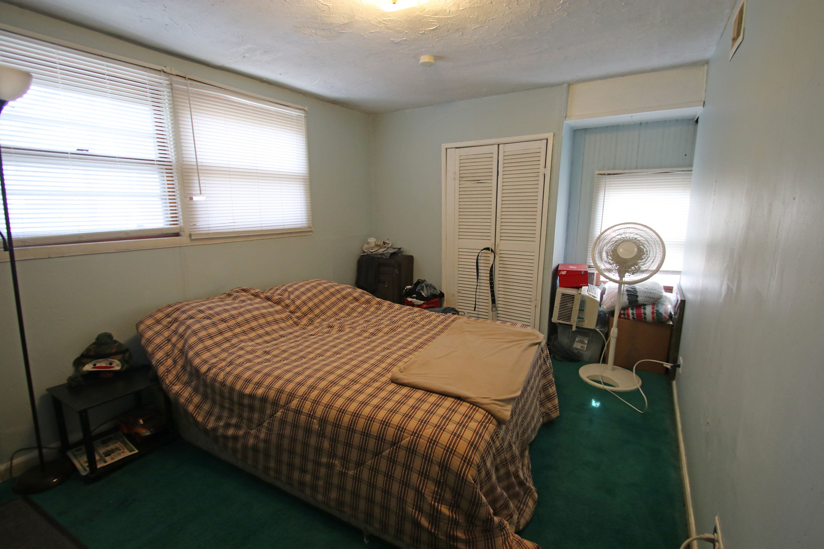 47 North Pistakee Lake Road Fox Lake, IL 60020 - Photo 11 of 15 a bed sitting in a bedroom next to a window