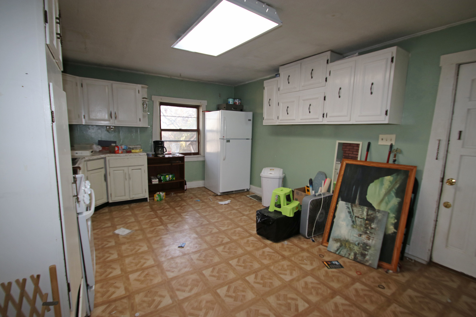 47 North Pistakee Lake Road Fox Lake, IL 60020 - Photo 3 of 15 a kitchen with cabinets and wooden floor