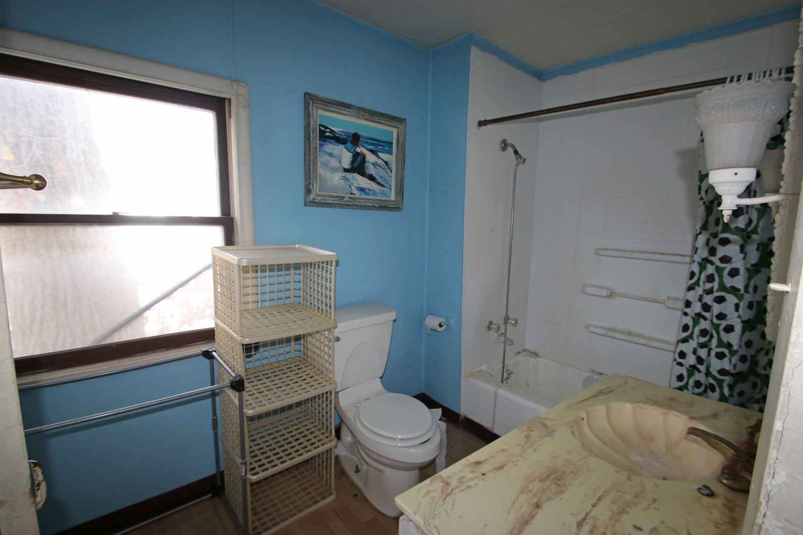 47 North Pistakee Lake Road Fox Lake, IL 60020 - Photo 8 of 15 a bathroom with a sink toilet and shower