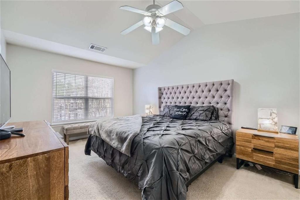 2296 Leicester Way Southeast Atlanta, GA 30316 - Photo 6 of 11 a bedroom with a bed and a window